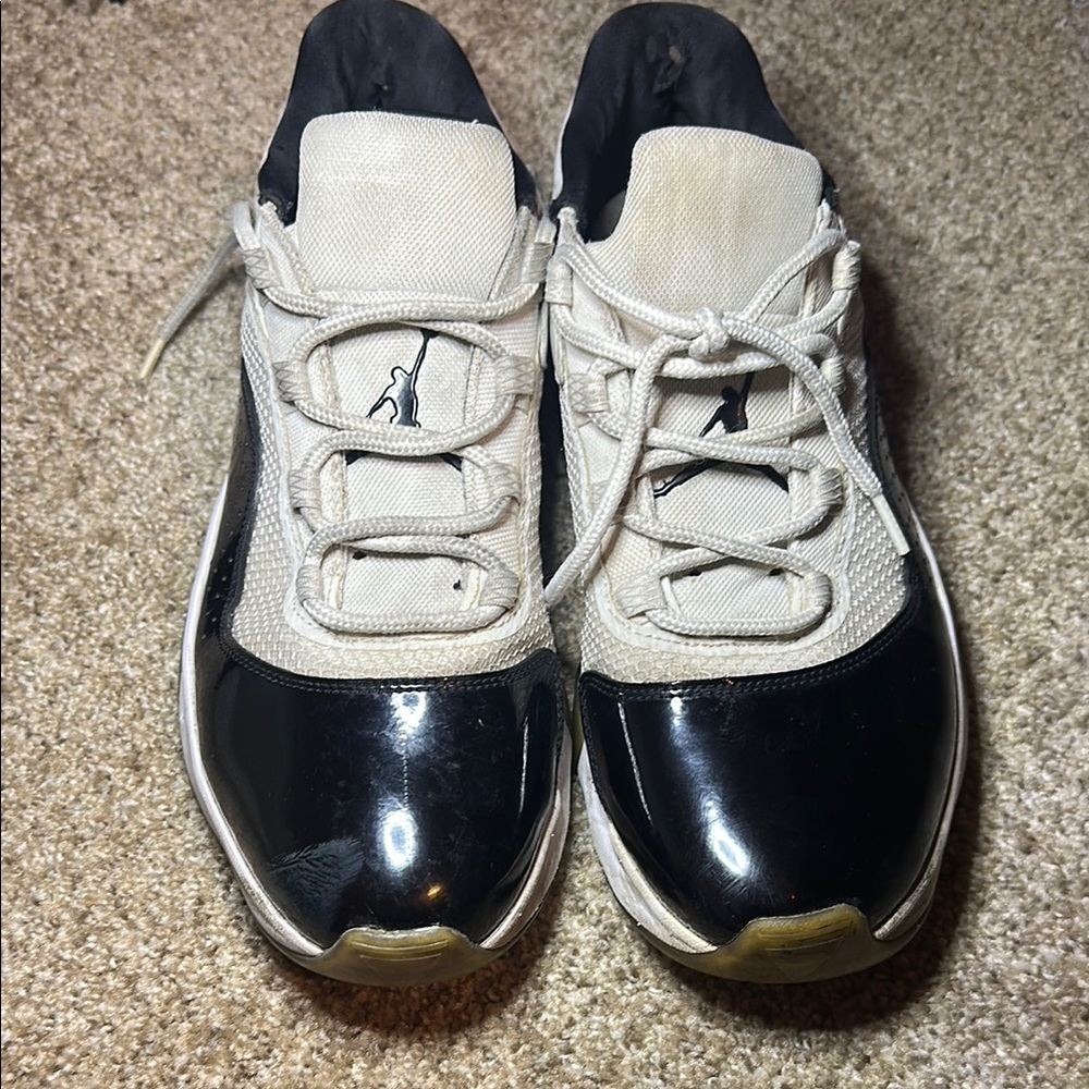 Jordan 11 Low Black and White Sneakers with Patent Leather